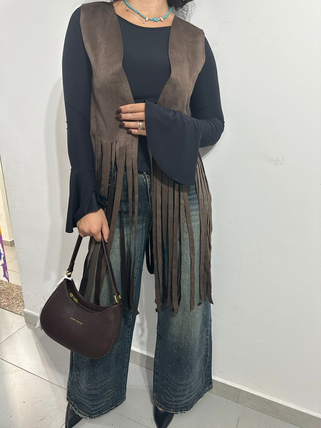 Gilet con frange in camoscio