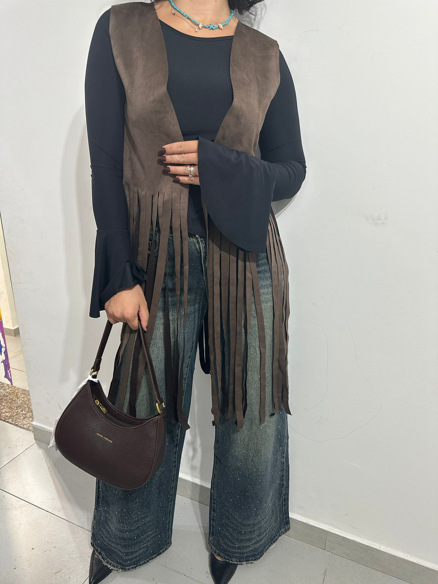 Gilet con frange in camoscio
